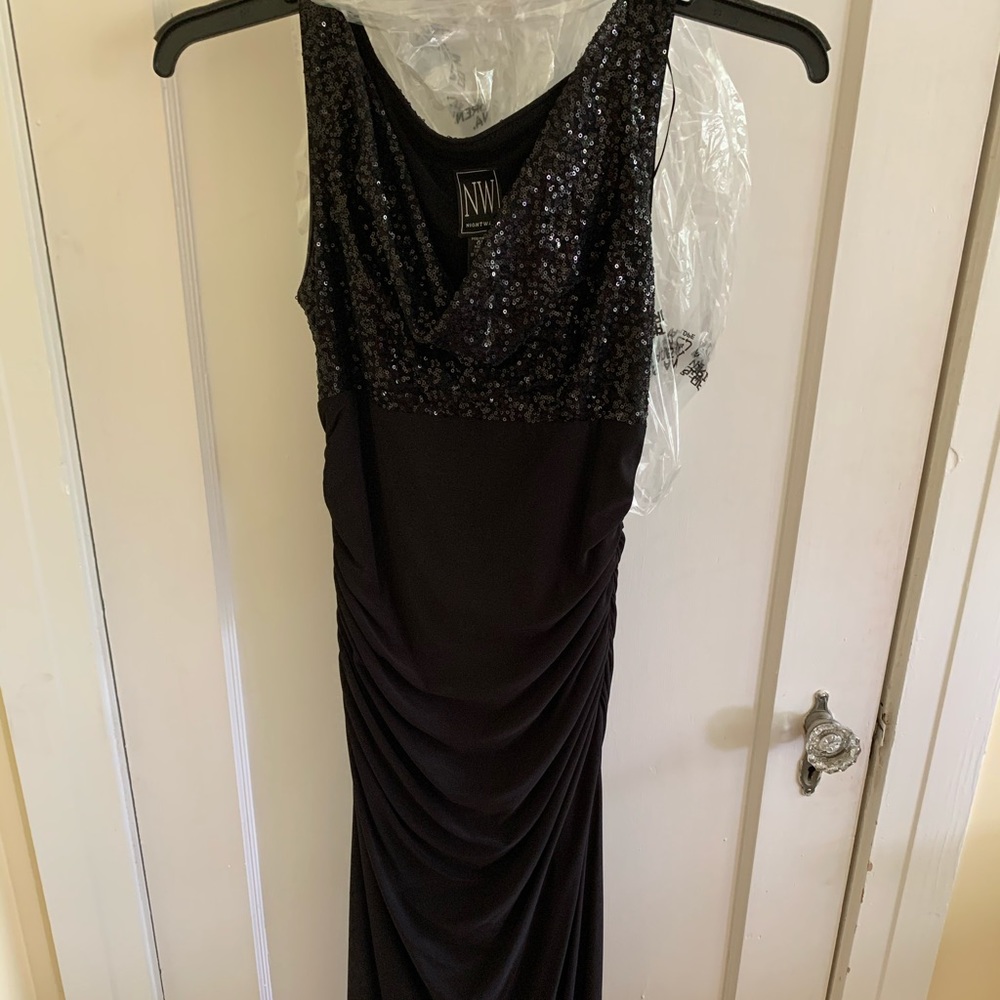 Long black dress. Sequin top.